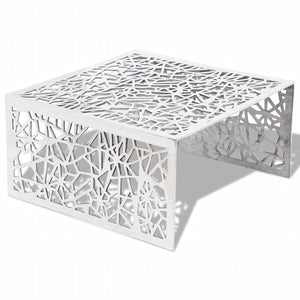 Silberner Couchtisch mit geometrischem Muster