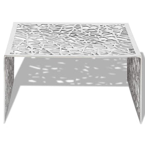 Silberner Couchtisch mit geometrischem Muster