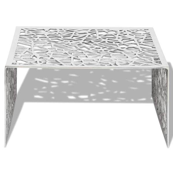 Silberner Couchtisch mit geometrischem Muster