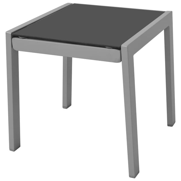 Schwarze Sonnenliegen mit Tisch