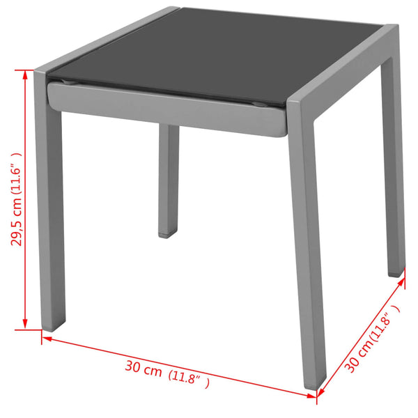 Schwarze Sonnenliegen mit Tisch