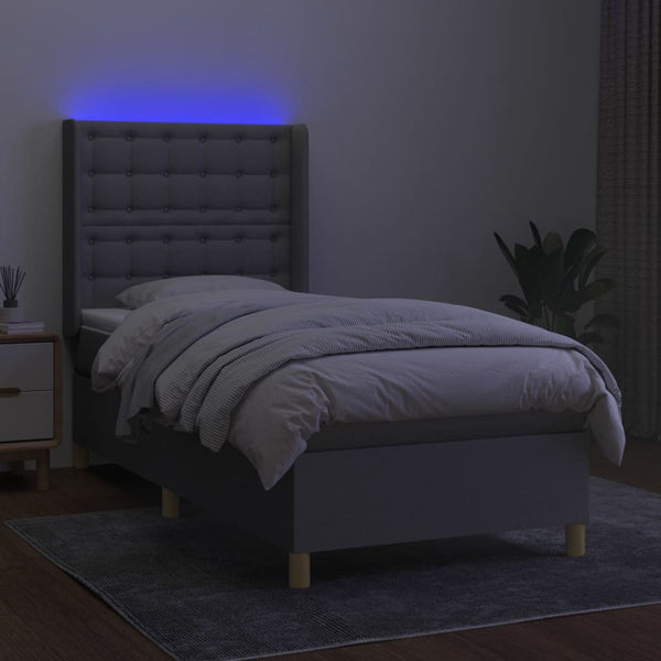 vidaXL Lit tapissier avec matelas et LED Gris clair 90x190 cm Tissu