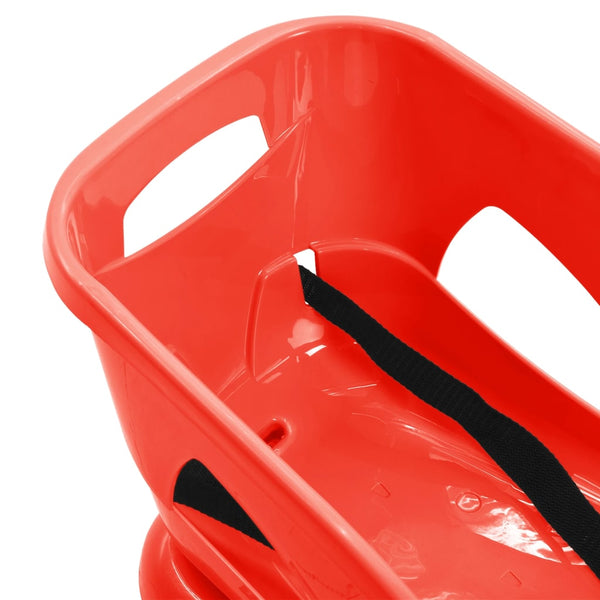 Roter Schlitten mit Rückenlehne