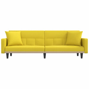 Hellgelbes Schlafsofa mit Kissen