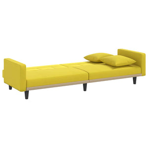 Hellgelbes Schlafsofa mit Kissen