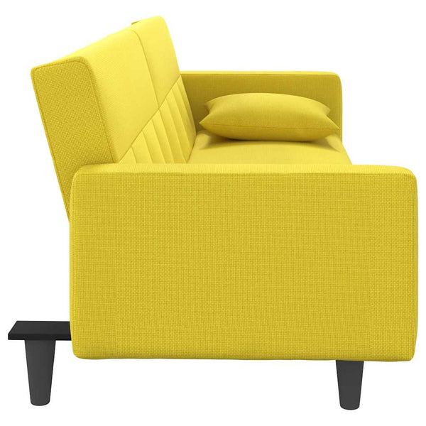 Hellgelbes Schlafsofa mit Kissen