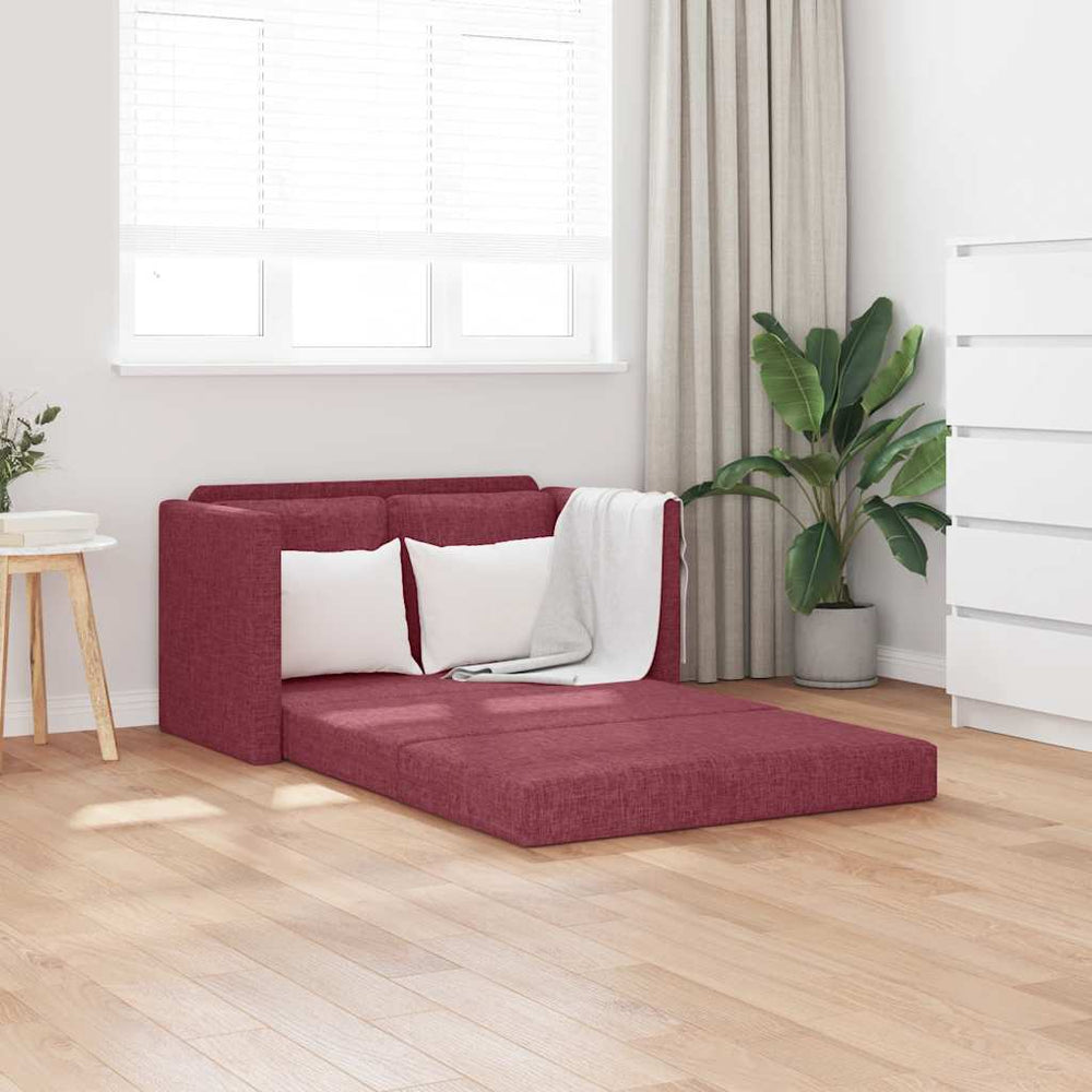 Weinrotes Bodensofa mit Schlaffunktion