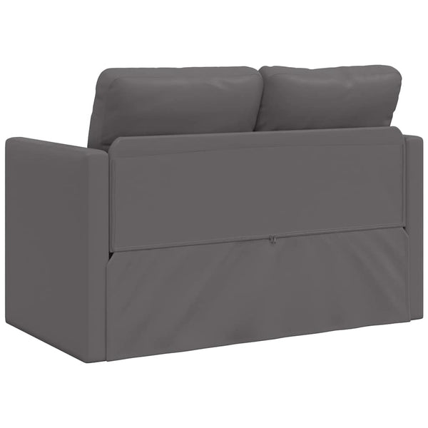 Graues Bodensofa mit Schlaffunktion