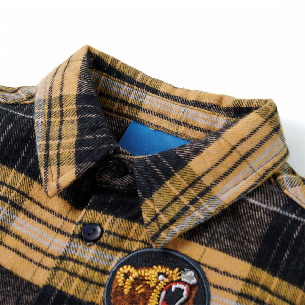 Chemise à carreaux jaune et noire pour enfant 128