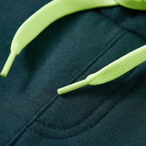 Pantalon de sport enfant avec cordon de serrage Vert mousse 92