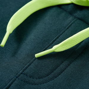 Pantalon de survêtement enfant avec cordon de serrage Vert mousse 140
