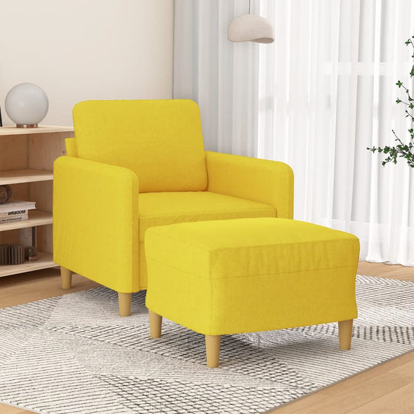 Hellgelber Sessel mit Hocker