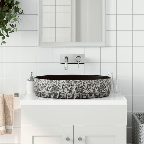 Lavabo à poser vidaXL ovale noir et bleu 56,5x36,5x13,5 cm en céramique