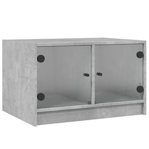Betongrauer Couchtisch mit Glastüren