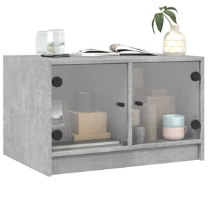 Betongrauer Couchtisch mit Glastüren