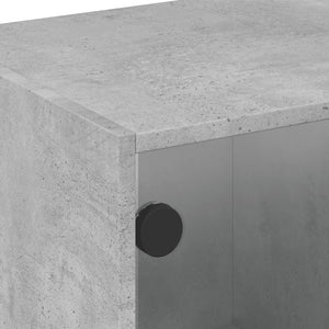Betongrauer Couchtisch mit Glastüren