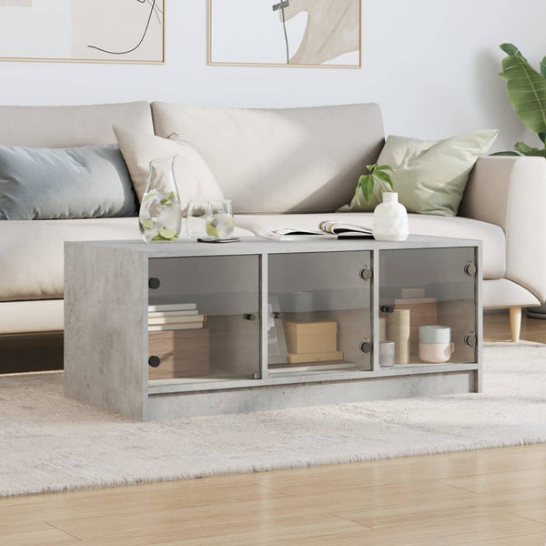Betongrauer Couchtisch mit Glastüren 102x50x42 cm