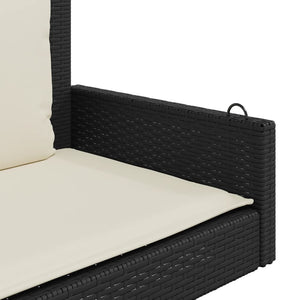 Schwarze Schaukelbank mit Kissen