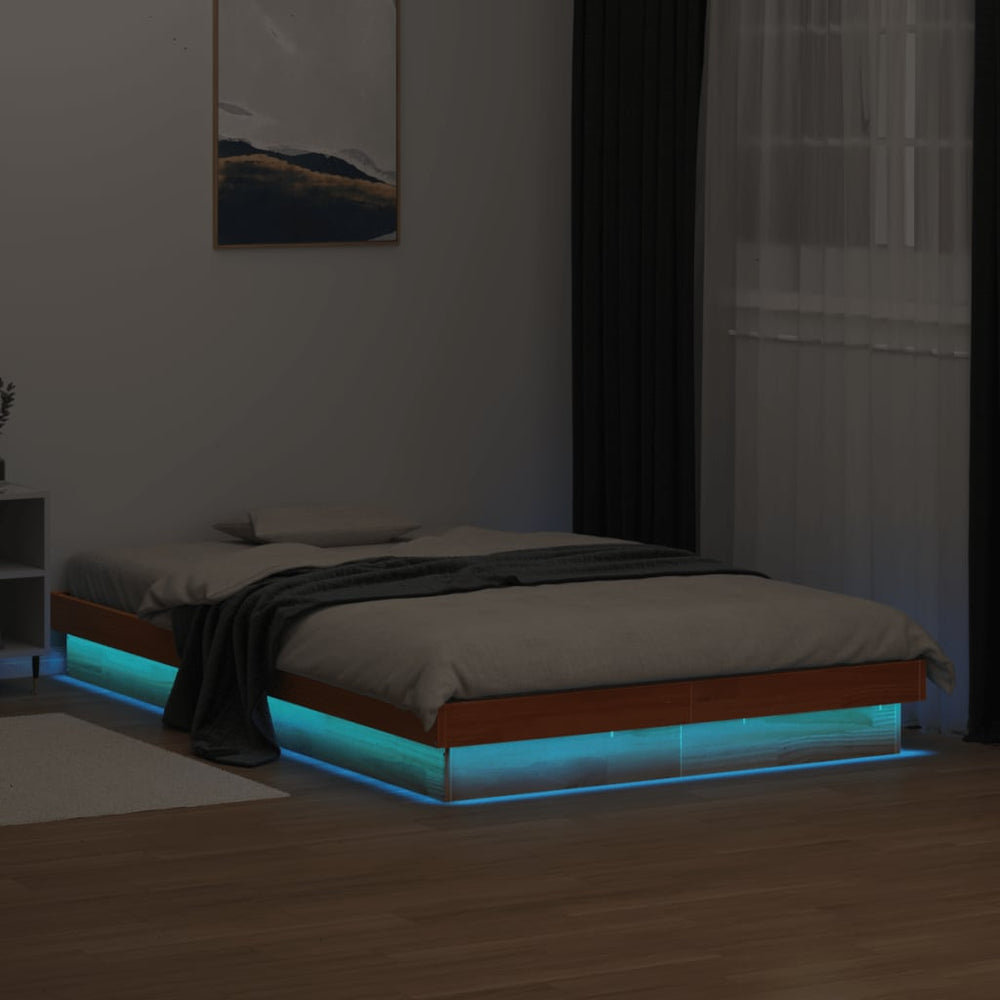 Massivholzbett 120x190 cm mit LED Kiefer Wachsbraun