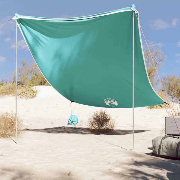 Grünes Strand-Schattenzelt mit Sandsäcken