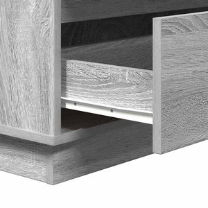 Grauer Nachttisch mit Schubladen