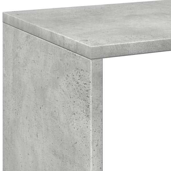 Betongraues Raumteiler-Bücherregal