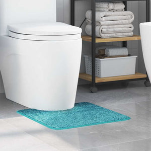 Türkise Badematte mit Toilettenausschnitt