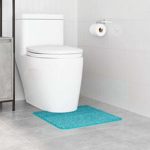 Türkise Badematte mit Toilettenausschnitt