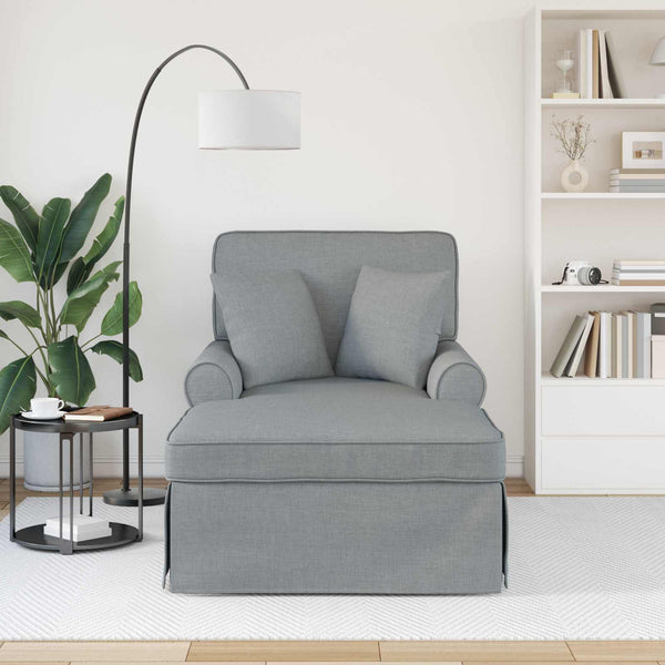 Hellgraue Chaiselongue mit Kissen