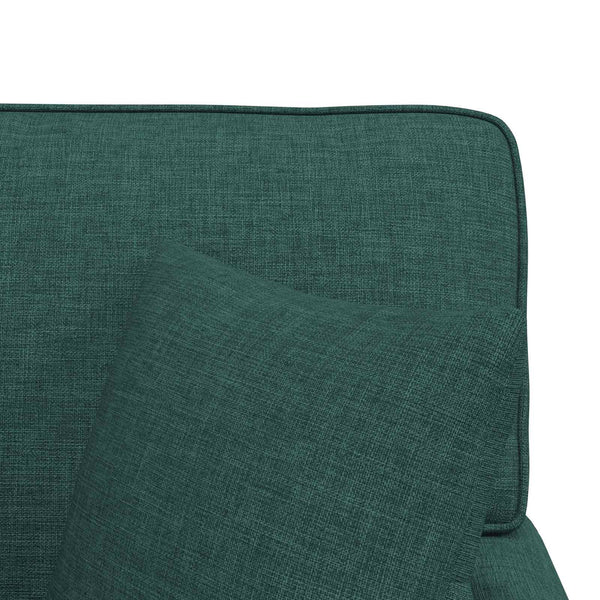 Dunkelgrüne Chaiselongue mit Kissen
